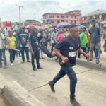 Police officer beaten by mob in Lagos after pushing man into path of BRT