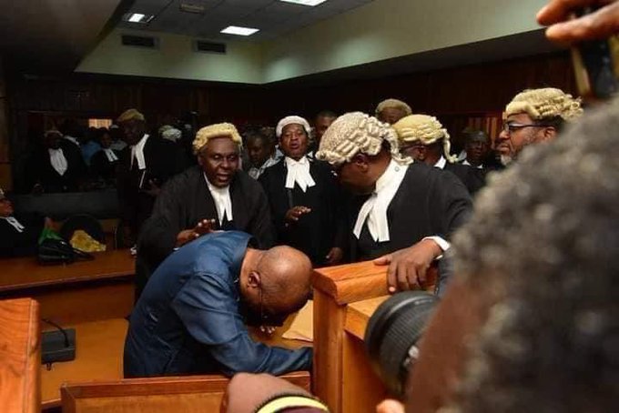 Viral video shows Emefiele hiding face in Court