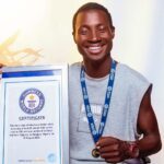 Nigerian freestyler sets Guinness World Records for ladder-climbing with Ball on head