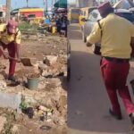 Lastma Official Goes Above and Beyond to Fill Pothole with Sand in Lagos