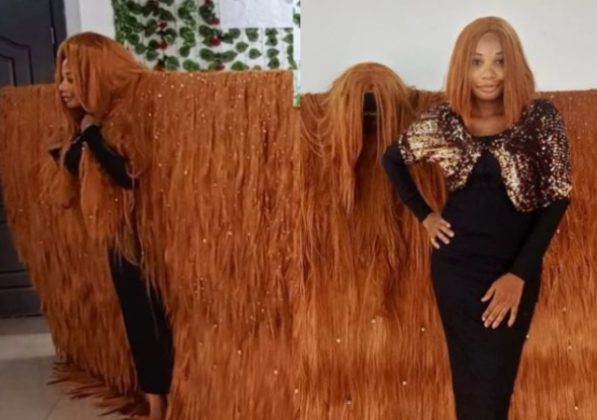 Nigerian Lady breaks Guinness World Record for the Widest Wig in the World