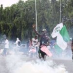 Police tear-gas #EndBadGovernance protesters in Abuja