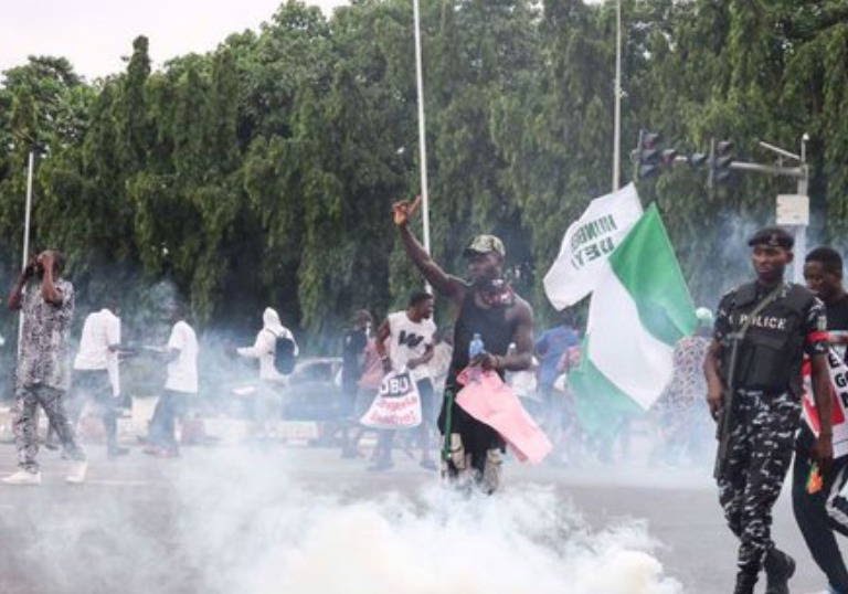 Police tear-gas #EndBadGovernance protesters in Abuja