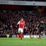 English Premier League: Arsenal and Liverpool Share Points in 2-2 Draw