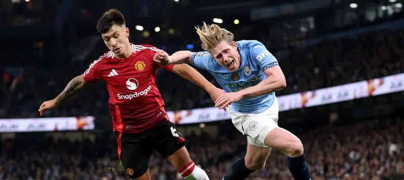 United Strike Late to Defeat City 2-1 and Intensify Champions’ Crisis